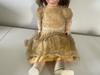 Dukkelise med lukkeøjne.