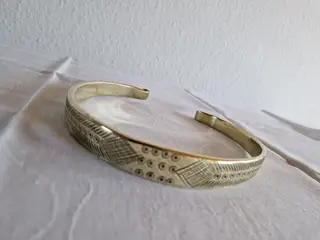 Museumskopi af Halsring , vægt 300 gram.