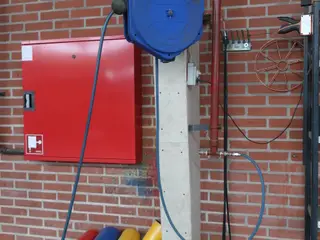 Slangeopruller til trykluft