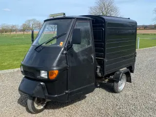 Piaggio Ape 50 (25 KMT) med oliefyr