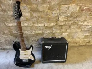 Guitar med forstærker