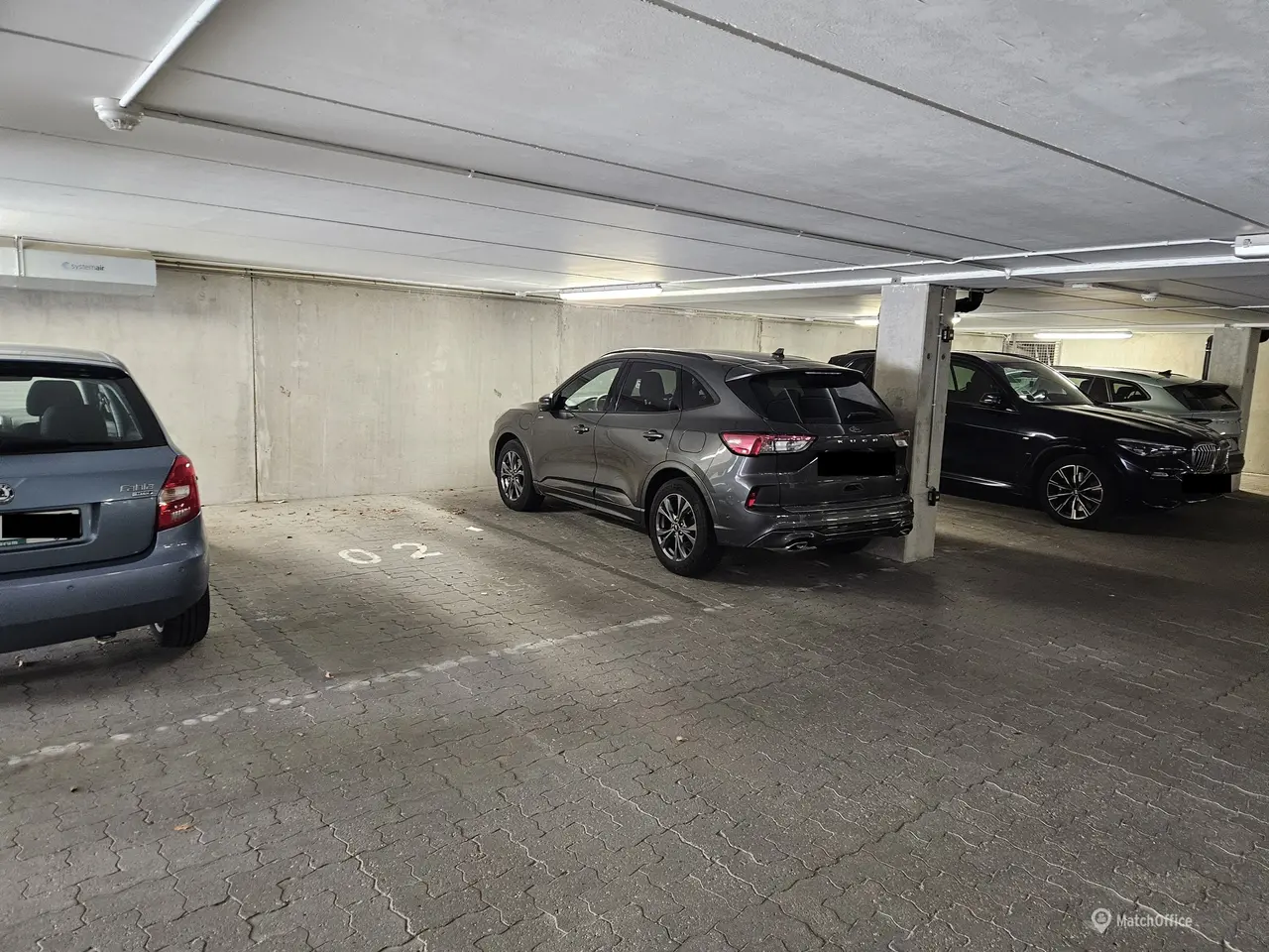 Billede 1 - P plads i kælder med kode/brik