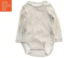 Hvid langærmet bodystocking til baby fra H&M (str. 68)