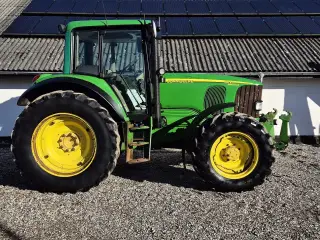 John Deere 6620 / AutoPower / med frontlift / 9900 timer