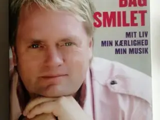 Smerten bag smilet af Johnny Hansen