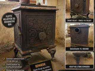 Gammel støbejernsovn med flotte detaljer