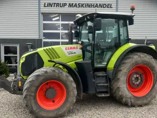CLAAS ARION 650 Cebis med frontlift