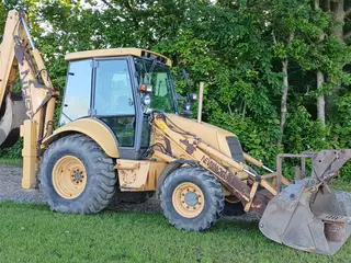 New Holland lb 95 4wd rendegraver
