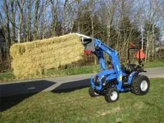 Solis S26 6+2 gearmaskine med servostyring og frontlæsser på