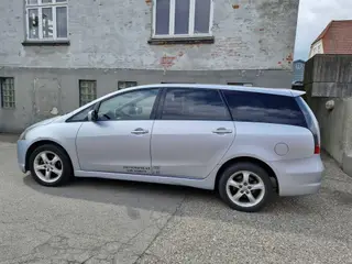 En ejer km 99800 10.000 kroner