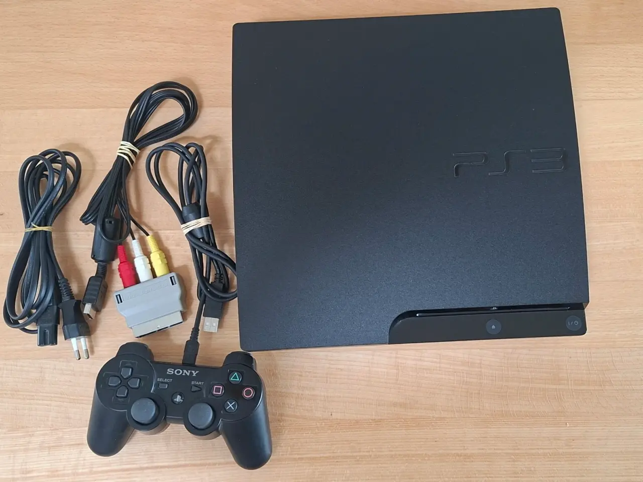 Billede 1 - Sony PlayStation 3 Slim-konsol i sort