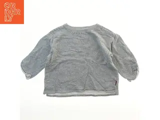 Grå sweatshirt med pynt på skuldrene fra Milk Copenhagen (str. 152)