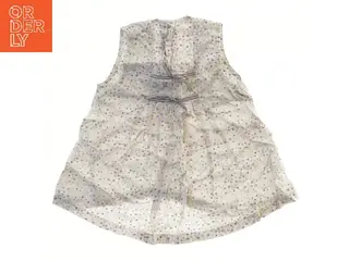Bluse med blomsterprint fra H&M (str. 74)