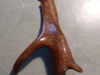 oplukker
