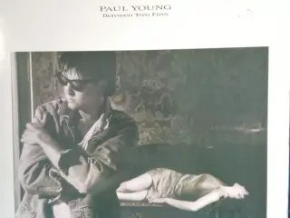 Paul Young: Between Two Fires