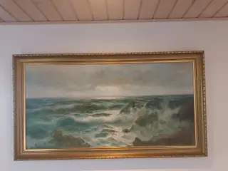 Flot oliemaleri af kystlandskab.