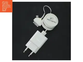 Hvid mobil oplader med adaptere fra Huawei (str. 10 cm)