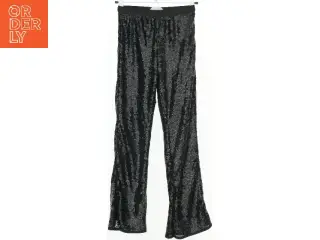 Glitrende sortbukser fra H&M (str. 134)