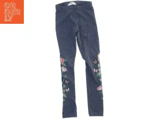 Blå leggings med blomsterprint fra H&M (str. 122)