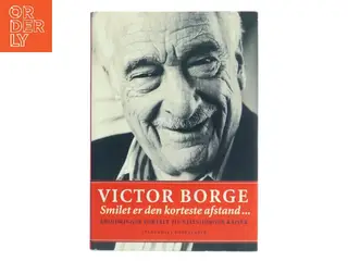 Smilet er den korteste afstand - : erindringer (Bog)