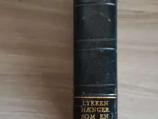Lykken hænger som en Drueklase