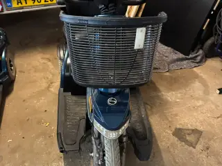 Blå el scooter 