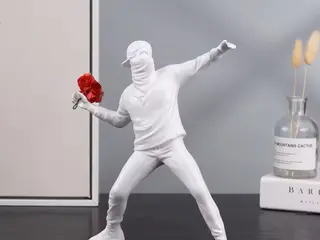 * Fed hvid figur - af Banksy