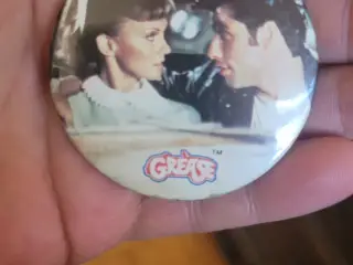 Grease badge