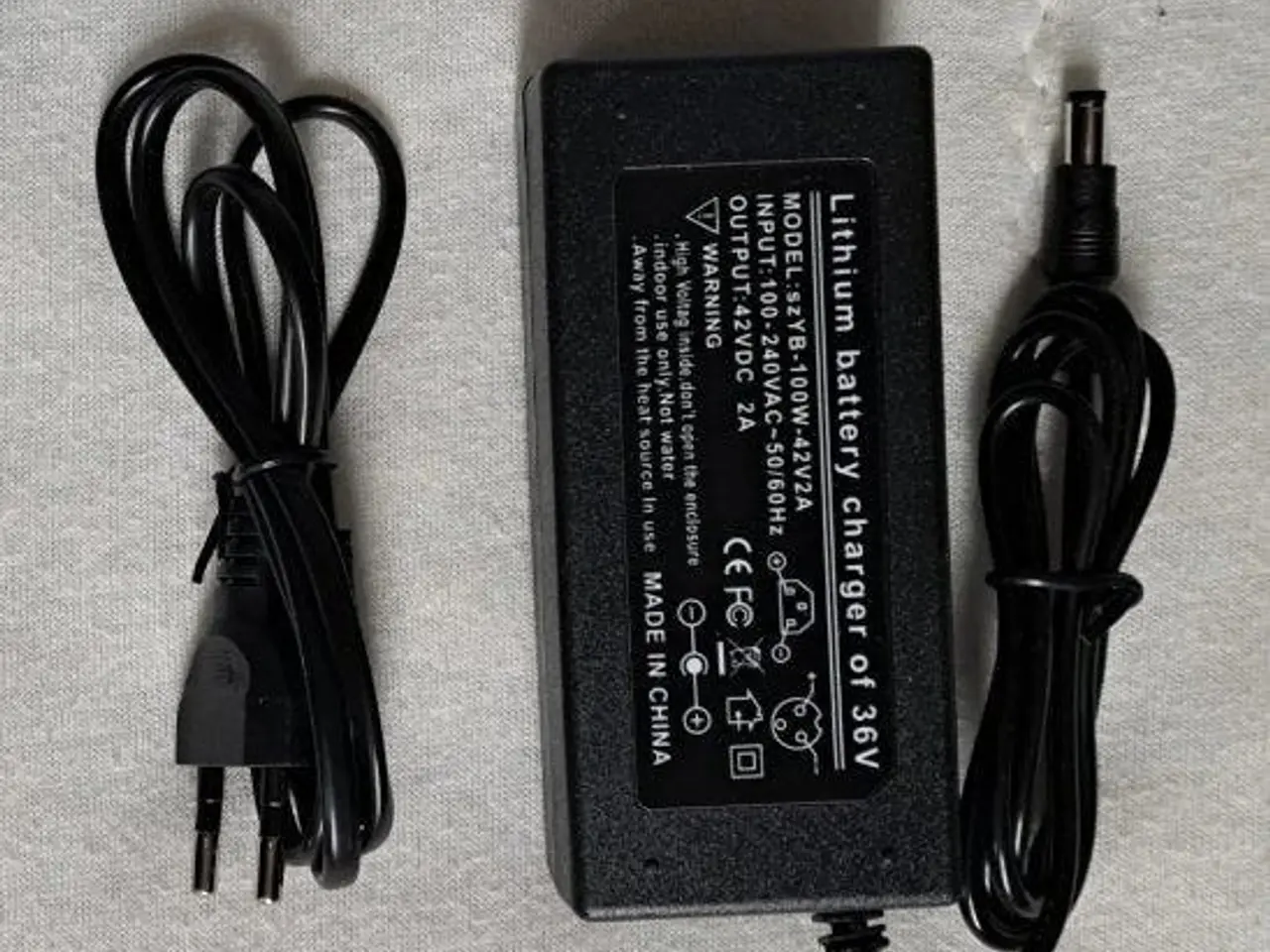 Billede 1 - Universal oplader 42V 2A til 36V el-cykel / løbehjul (5,5x2,1 mm)