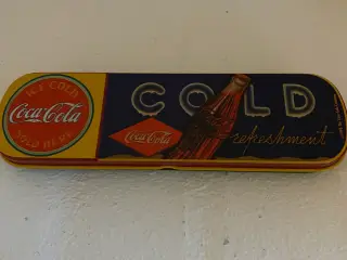 Coca-Cola metal penalhus