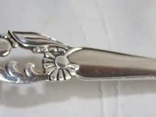 Gennembrudt" sølvplet