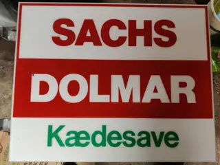 Sachs Dolmar reklameskilt.