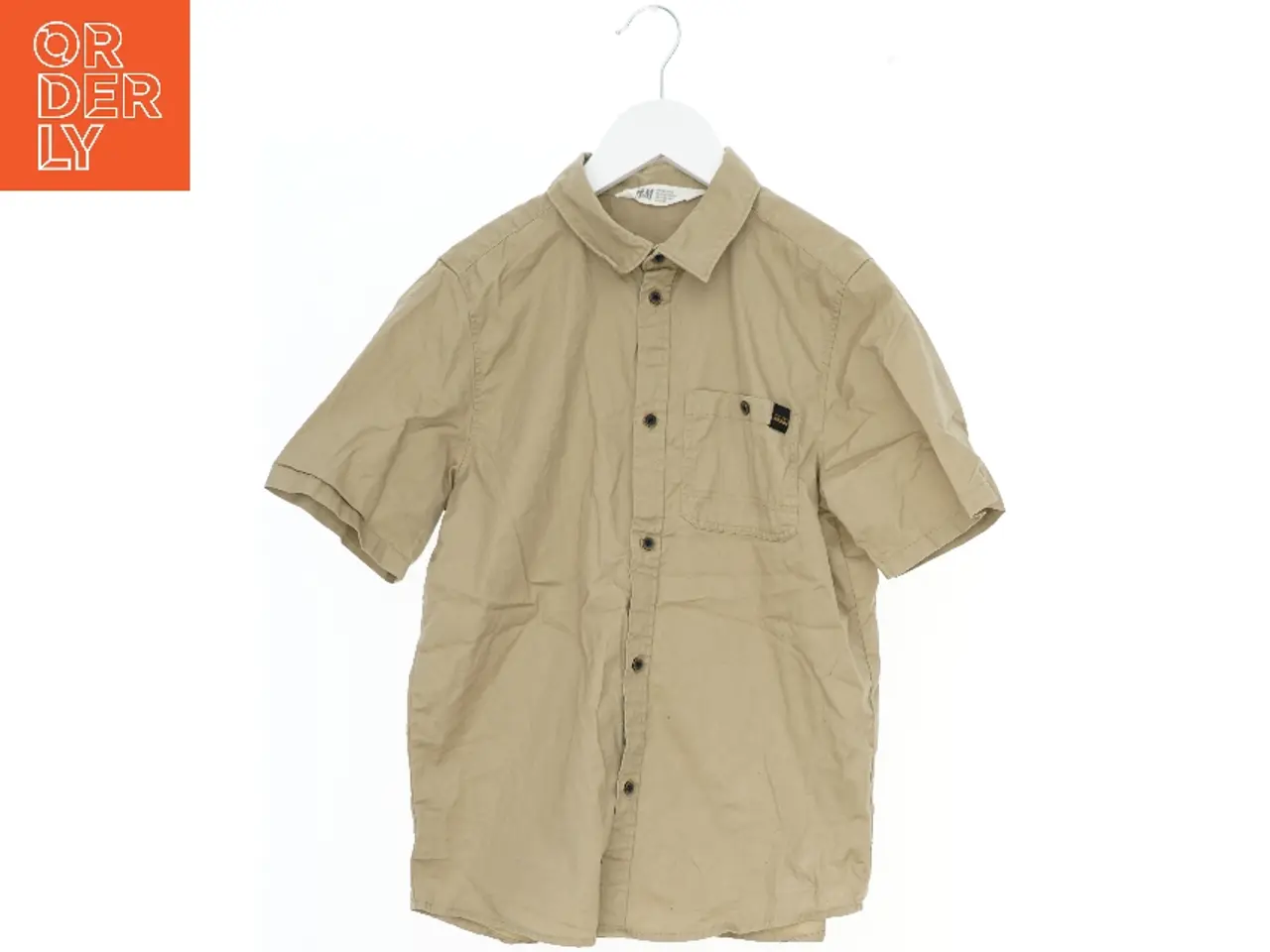 Billede 1 - Kortærmet skjorte fra H&M (str. 152)