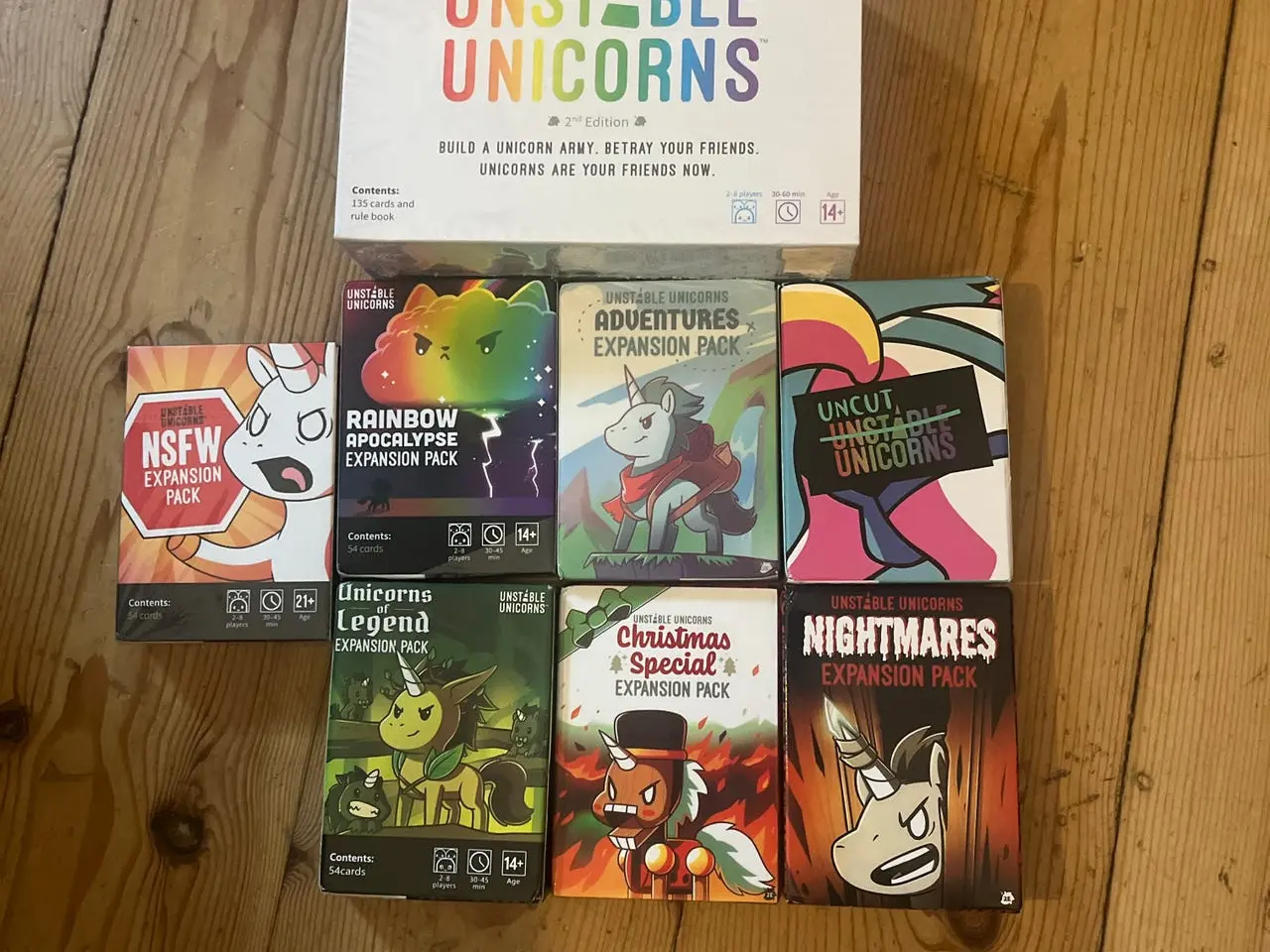 Billede 1 - Unstable Unicorns brætspil med 7 expansion packs