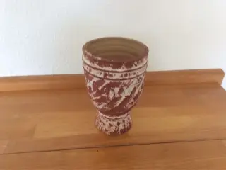 Urtepotte skjuler