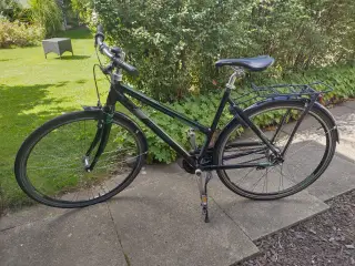 Centurion Challenger cykel med 7 gear og 2 nøgler.