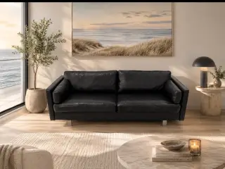 2,5 Pers Skalma sofa i sort okselæder,på stålben.