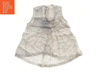 Bluse med blomsterprint fra H&M (str. 74)