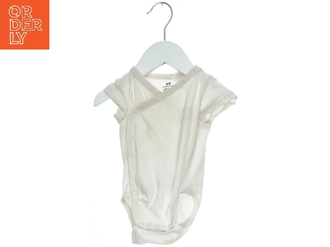Billede 1 - Hvid bodystocking til baby fra H&M (str. 62)
