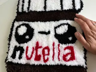 Vægtæppe nutellakrukke