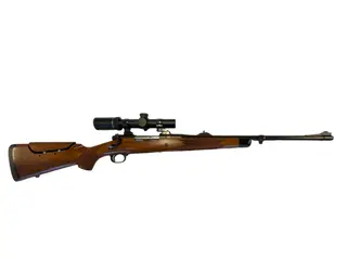 Winchester M 70 kal. 375 H&H håndbygget safaririffel med kikkert