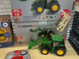 Fjernstyret John Deere trakter fra siko. ubrugt.