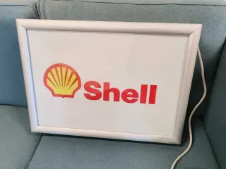 Shell lysskilt