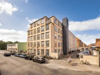 Industriel elegance og eksklusiv komfort tæt på city, metro og med egne p-pladser