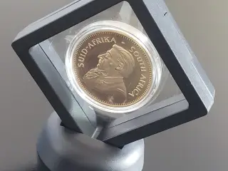 Krugerrand medalje i uædelt metal i bordholder