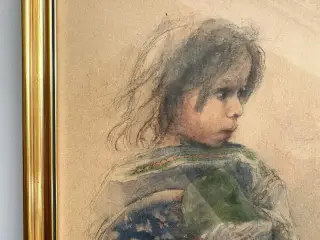 Barn i guldramme, mørkt hår