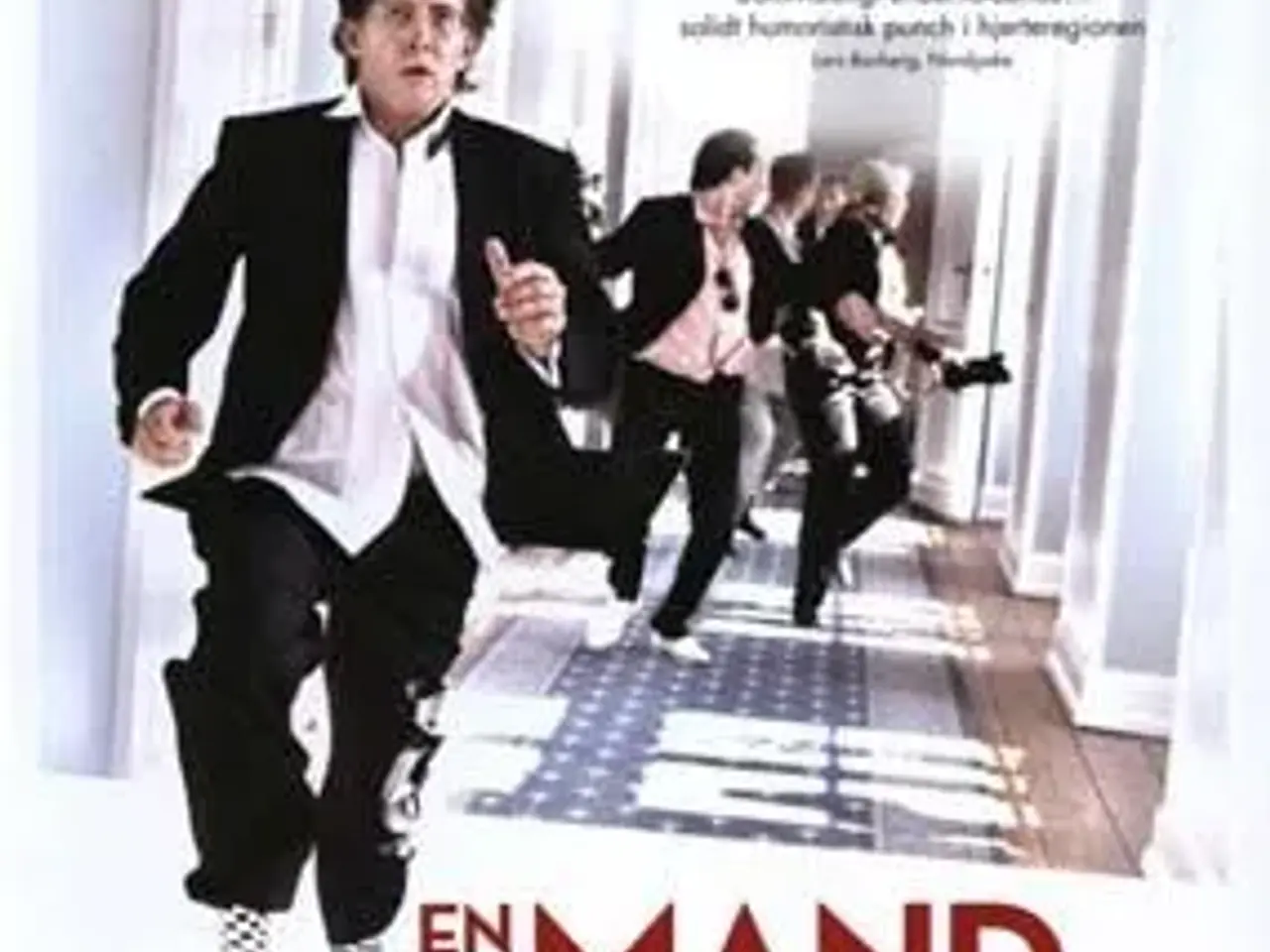 Billede 1 - Top film ; EN MAND KOMMER HJEM