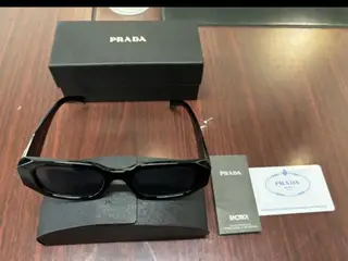 Prada solbriller smid et bud