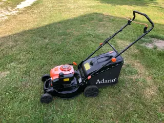 Plæneklipper med bioklip samt opsamler