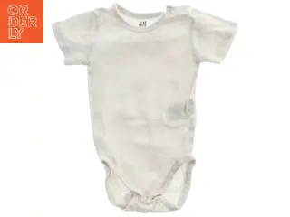 Hvid bodystocking til baby fra H&M (str. 68)
